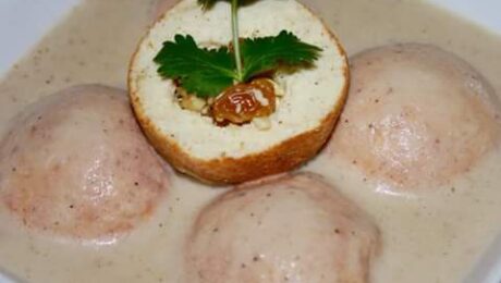 Bolas fritas de panir en salsa (Malai Kofta)