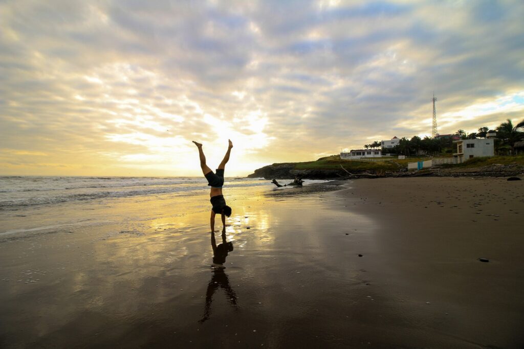 500px provided description: Yoga takes us to the present moment the only place where life exist. Namast? [#sunrise ,#morning ,#water ,#nature ,#mexico ,#beach ,#travel ,#man ,#body ,#life ,#love ,#pose ,#world ,#yoga ,#quotes ,#handstand ,#loveyoga]