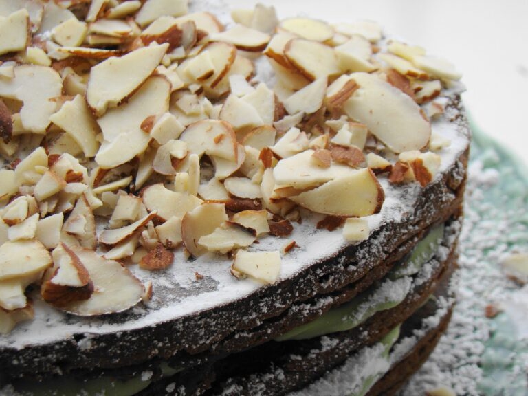 Maybe I'll share the recipe.... Ok: In a mixer combine: 1/8 cup vegetable oil 1/4 cup avocado 1 cup cake flour 5 tbsp cocoa powder Pinch of salt 1 tsp baking powder 3/4 cup raw sugar or agave syrup 1 cup coconut milk 1 tsp vanilla 1/4 cup ground almonds or almond meal 1 tbsp apple cider vinegar Pour into a "greased" pan of choice. Pop into oven at 350 degrees and bake 30-40 minutes depending upon size of pan. Edges will pull back when done. Melt 1 cup sweetened chocolate - cut into batter 15 minutes into baking. Avocado buttercream: 1 avocado 1 # powdered sugar 1 tsp vanilla 4 tsp lemon juice Blend and whip until the icing is the consistancy you like. Ice cake and garnish with toasted almonds. Yields 1 cake or 4 small bundts.