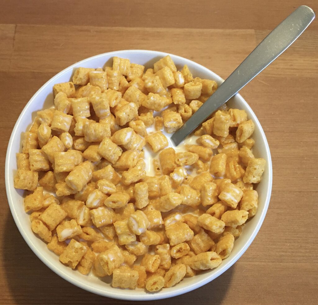 Cap'N Crunch – Sweetened Corn & Oat Cereal, with milk