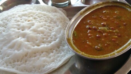 Appam is a South Indian pancake dish, made with fermented rice batter and coconut milk, common in the South Indian states of Kerala, Karnataka and Tamil Nadu as well as in Sri Lanka. Kadala curry is Kerala style black chickpea curry made using grated fresh coconut and a few spices. Kattan Chai It is a tea brewed with mixed spices and tea leaves. (milk is optional)
